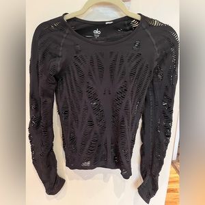 alo Yoga Wander top , size M black . Laser cutout detail . Excellent condition.
